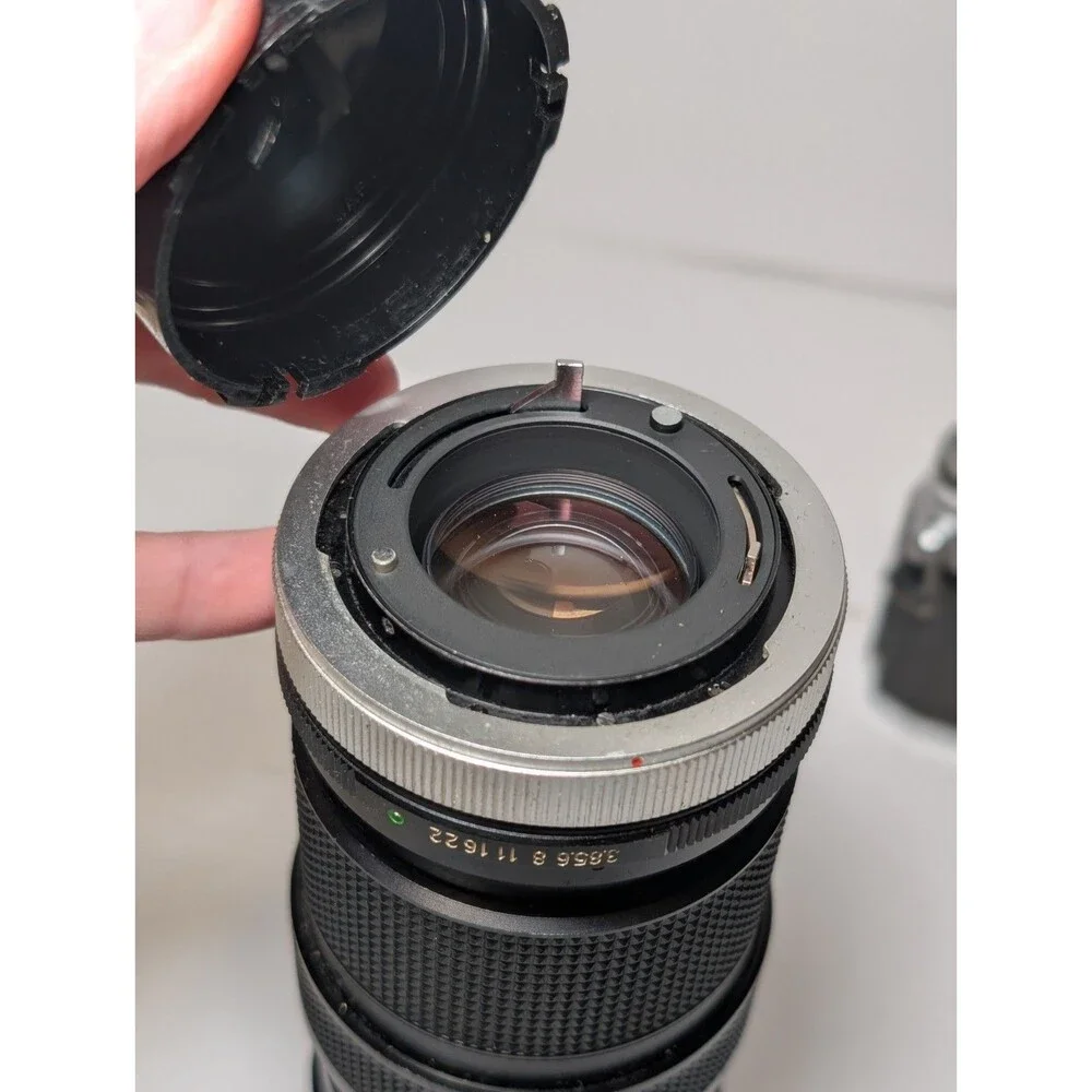 Canon AT-1 35mm Film Camera + 50mm f/1.8 Lens and Vivitar 75-205mm f/3.8 lens